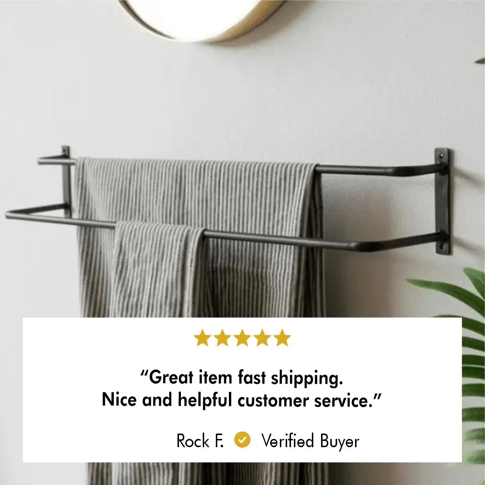 close-up of a black towel holder adorned with striped towels, accompanied by a customer review stating, "Great item, fast shipping. Nice and helpful customer service."