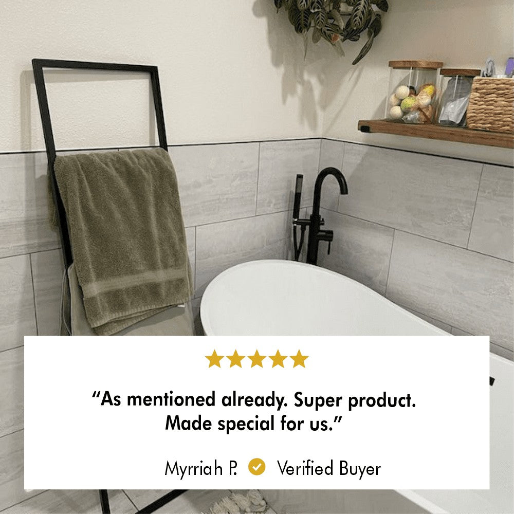Floor Mounted Towel Ladder mounted in a modern bathroom setting.