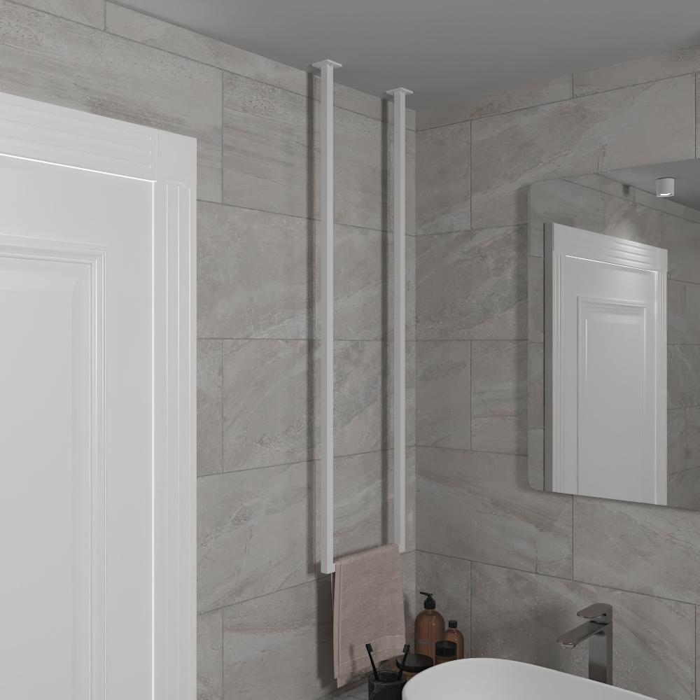 Minimalist white ceiling-mounted towel holder in a modern bathroom with light gray tiled walls and a white door, near a mirror. The sleek design adds a modern touch to bathroom decor.