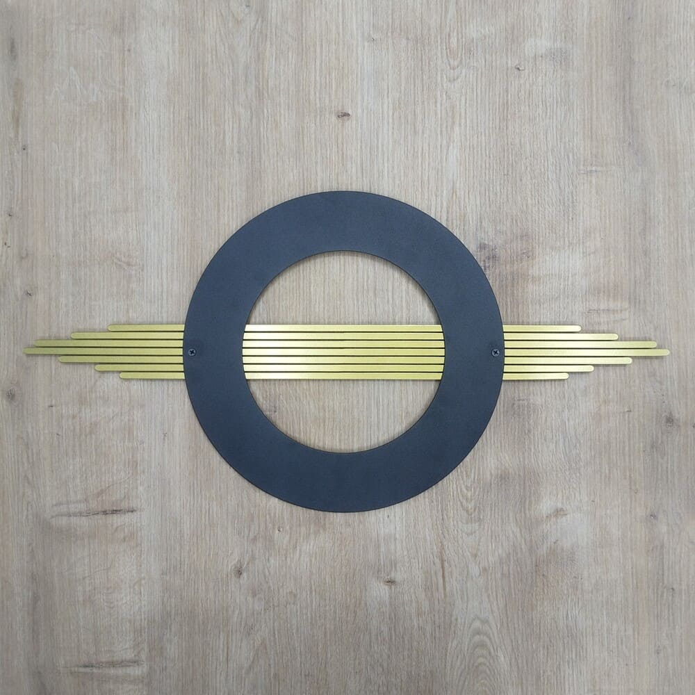 Vita Home 3D metal wall art featuring a bold black circular frame with gold geometric details.