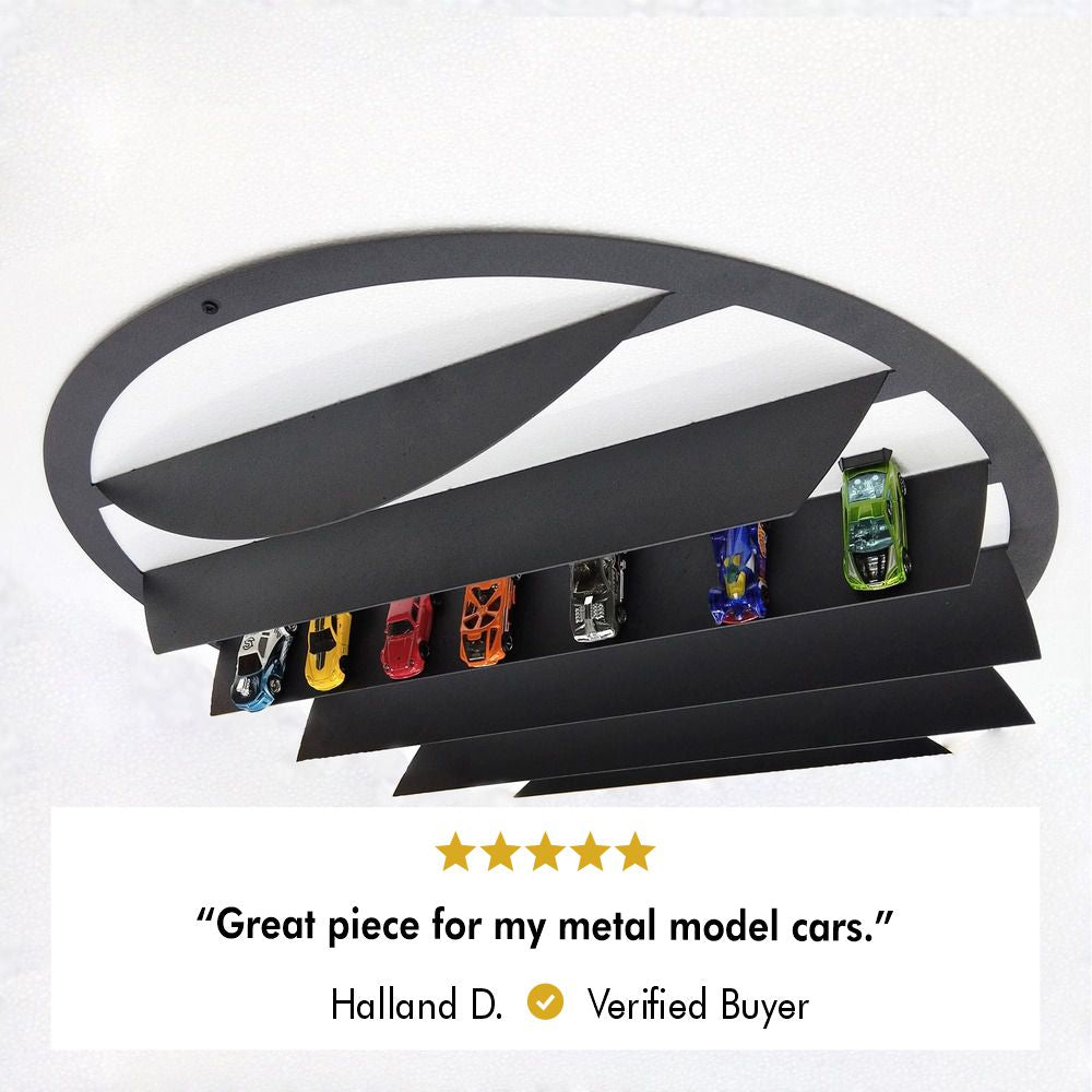 Black metal wall-mounted shelf with horizontal tiers for a model car collection display.