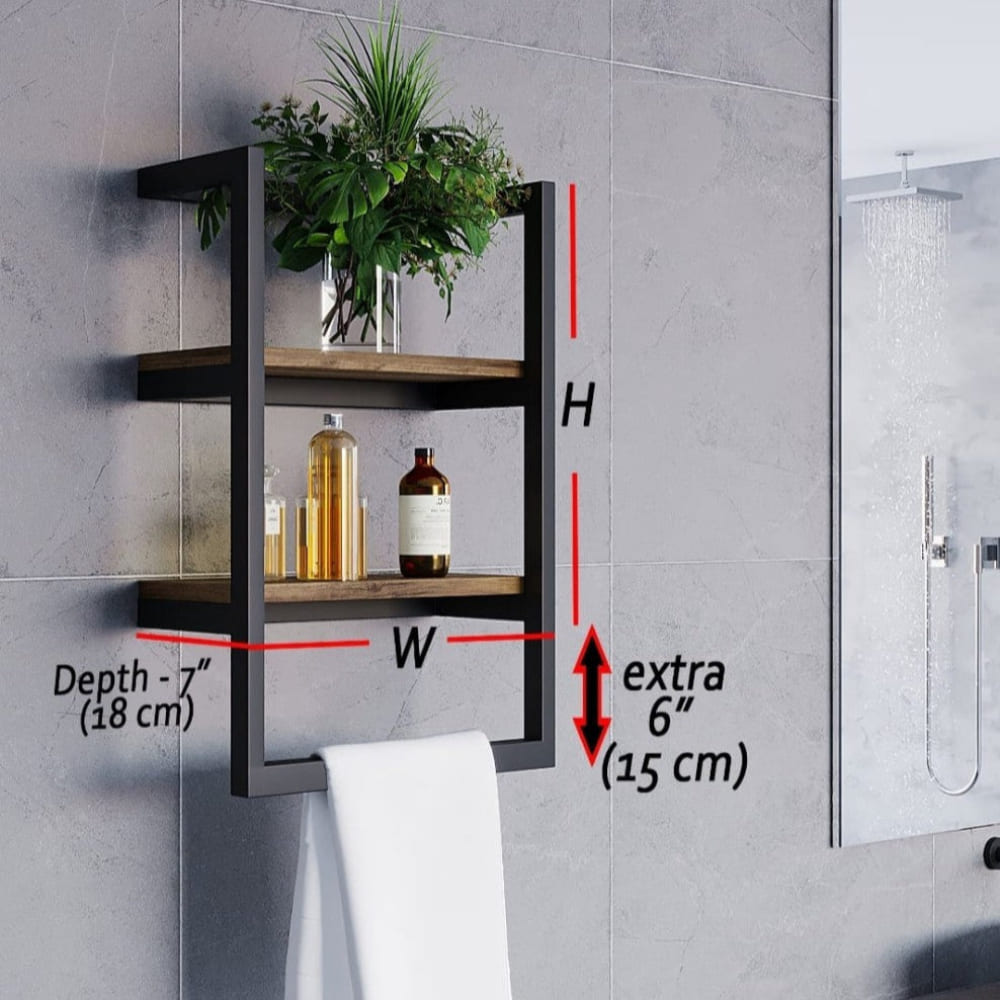 A black wall-mounted shelf with wooden tiers, styled with a plant and bottles, showing annotated dimensions including height, width, depth, and an additional towel hanging length.