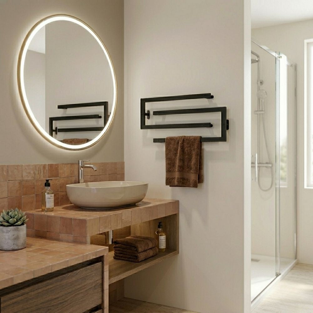 Black wall mounted swivel towel rack in a warm bathroom with round mirror and shower.
