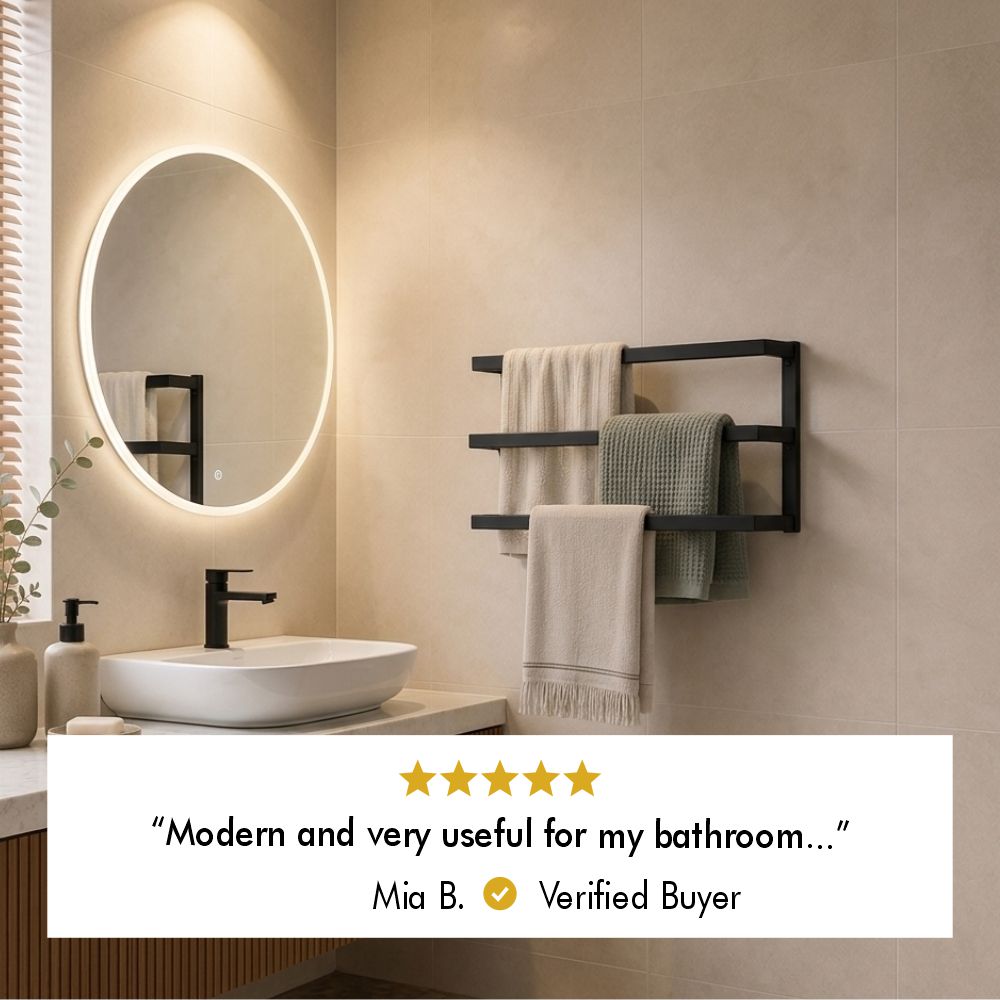 Five-star customer review from verified buyer Mia B. saying the triple towel bar rack is modern and useful for the bathroom.