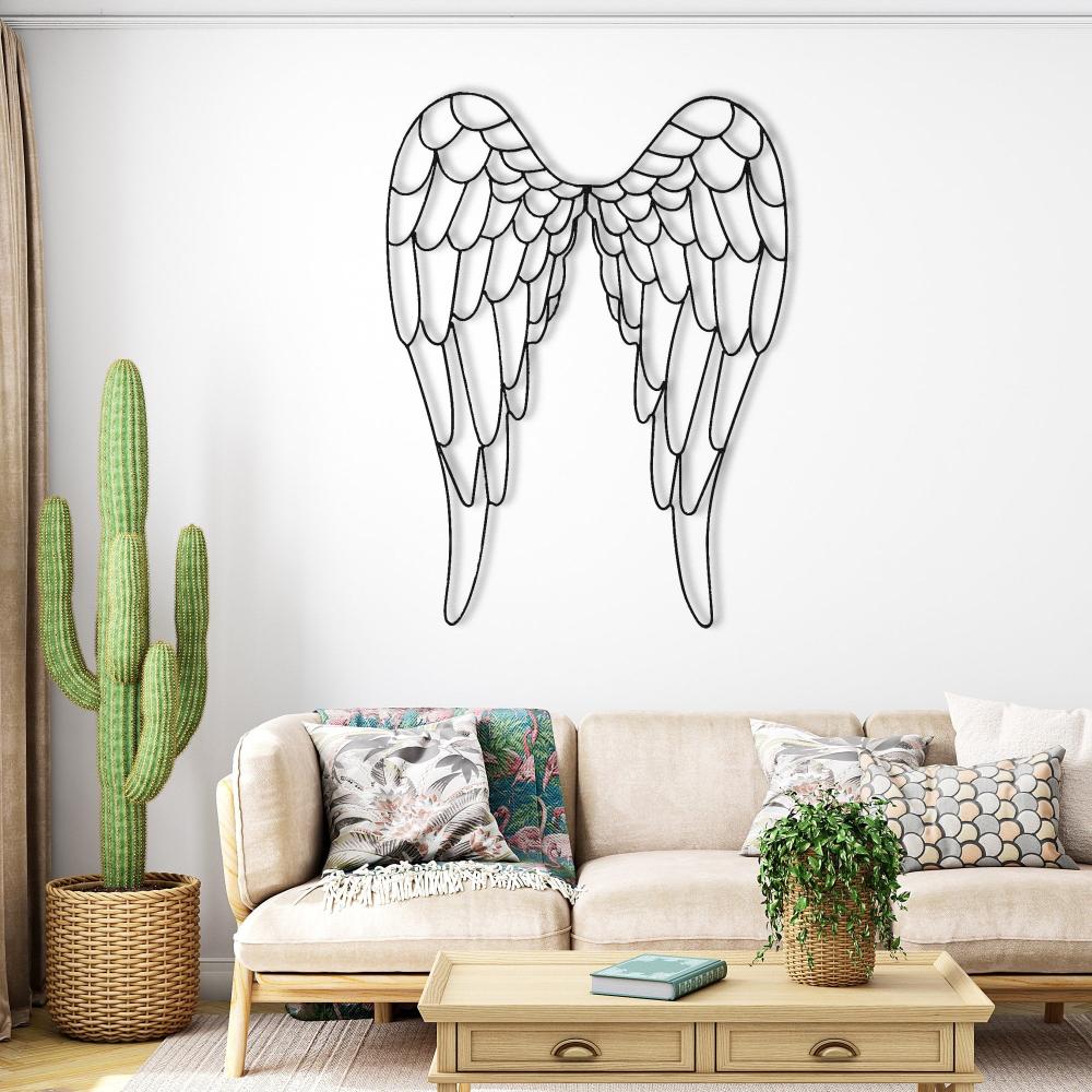 Angel Wings Metal Wall Art in a living room