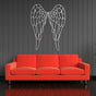 White Angel Wings Metal Wall Art in a living room