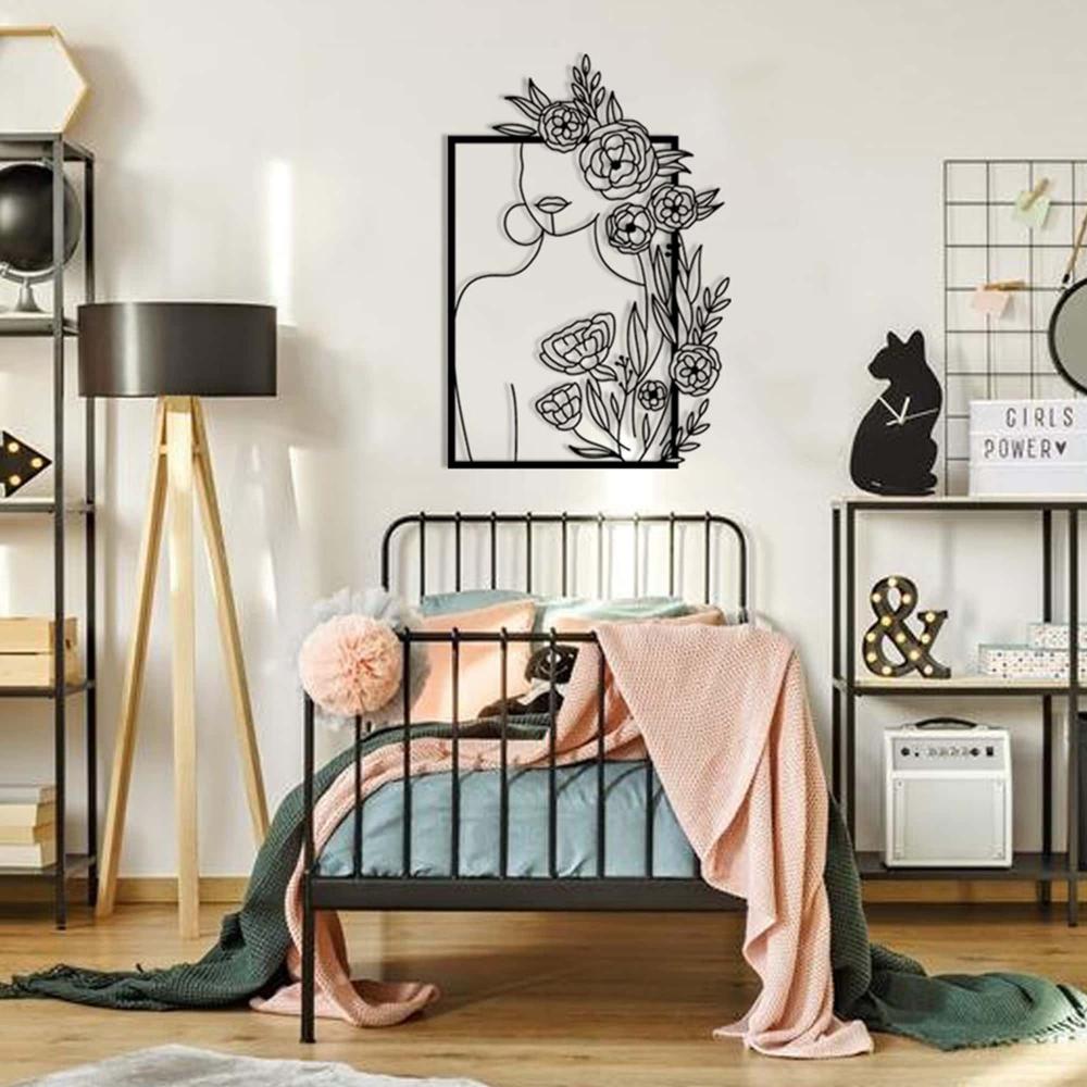 Woman Silhouette and Roses Metal Wall Art in a bedroom